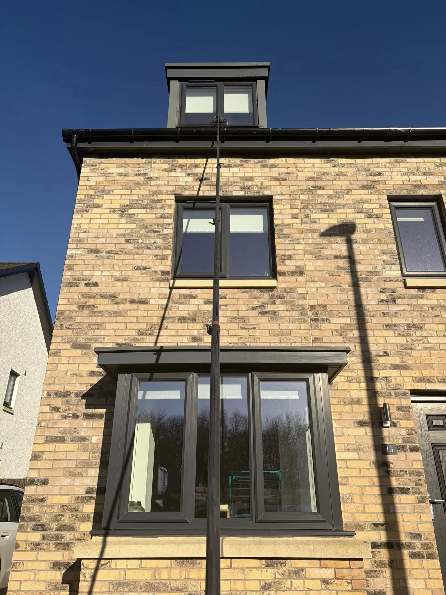 Pure water reach-and-wash window cleaning on a residential property in Fife